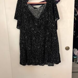 Torrid size 4 dark leopard print peplum top with lace up detail.